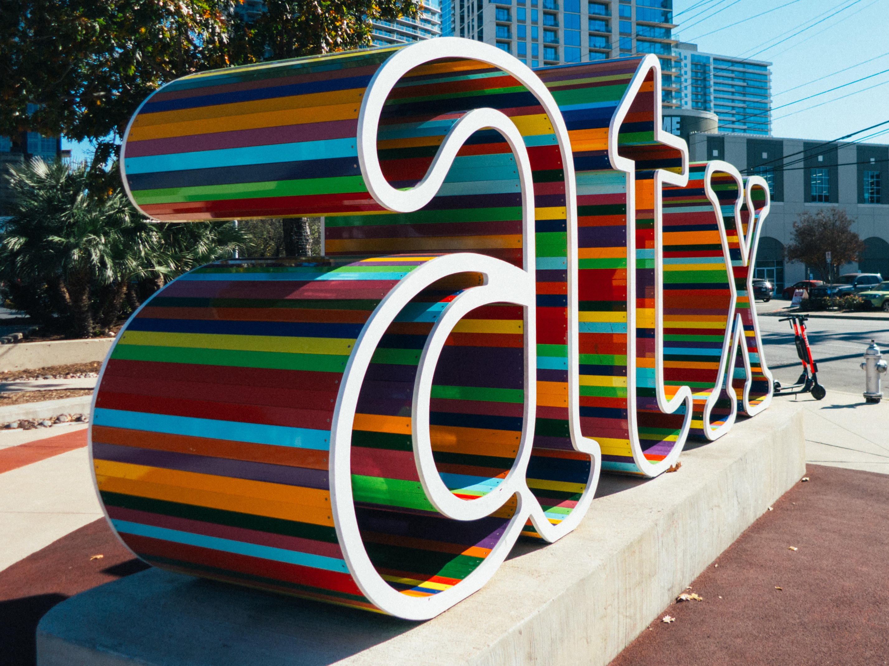 A colorful ATX sign located in Austin, Texas on Fifth and Lamar