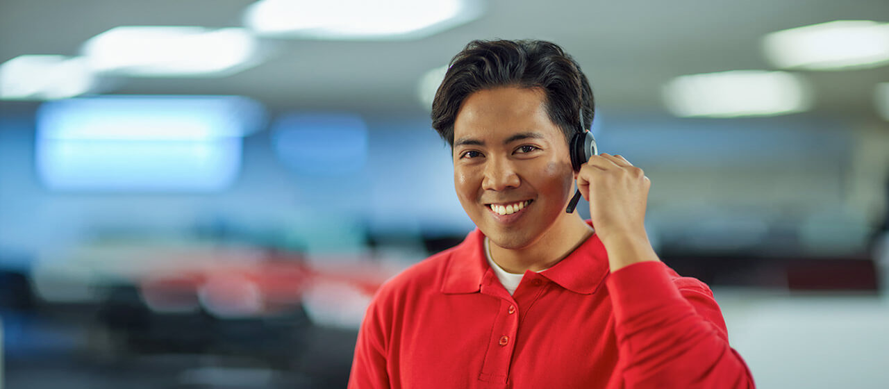 A man talking through a headset
