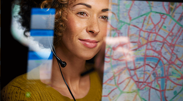 Woman Checking Commercial Container Locations